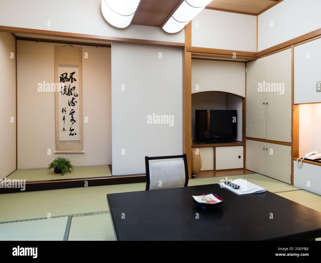 Suwa, Japan - October 21, 2017: Traditional Japanese style room with tatami floor mats in Aburaya Ryokan Stock Photo