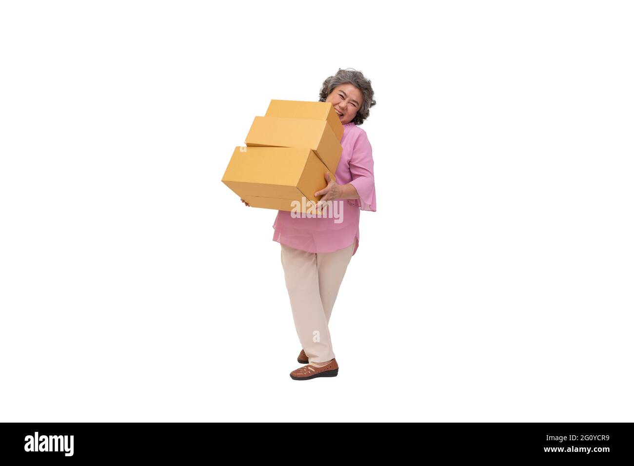 Happy asian senior woman holding package parcel box isolated on white ...