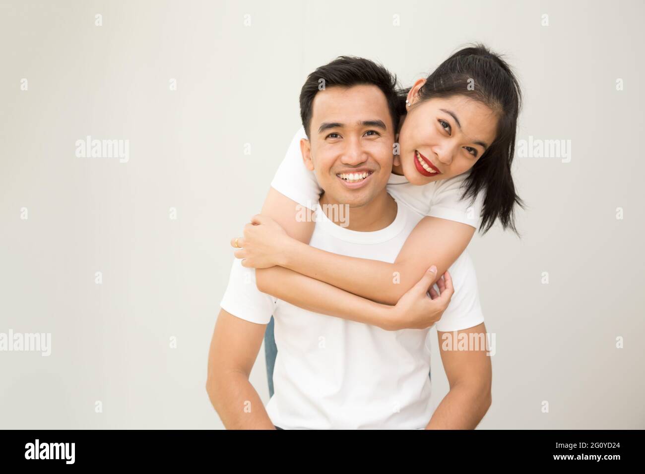 Happy Asian couple hugging and in love, Valentines day concept Stock Photo