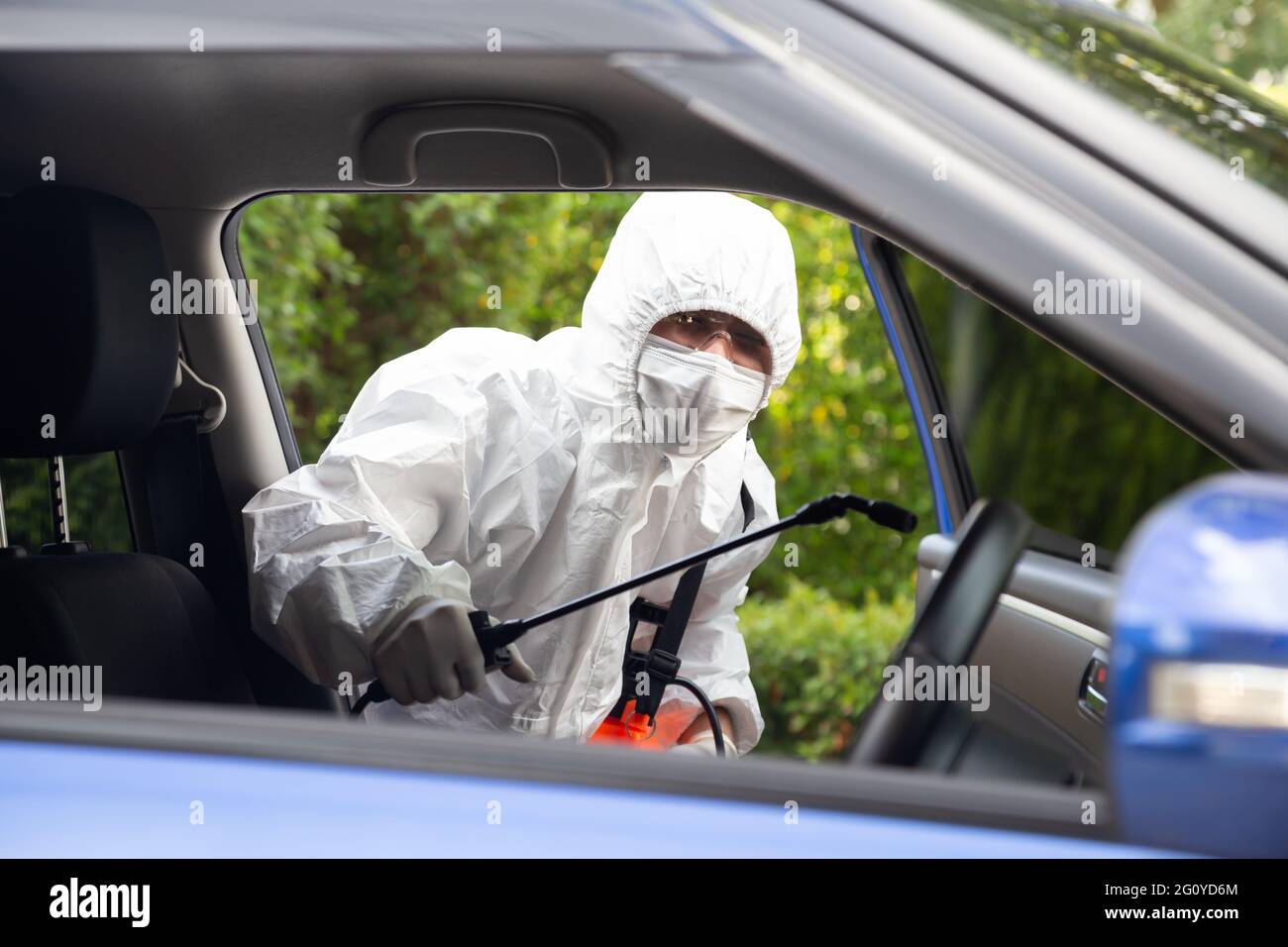 Virologist man wearing PPE kits kills bacteria and viruses inside the