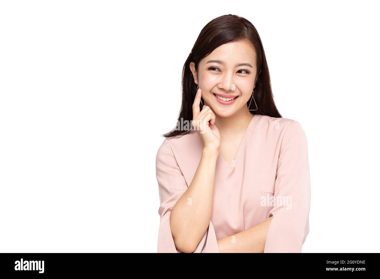 Portrait of beautiful young Asian woman thinking and looking aside ...