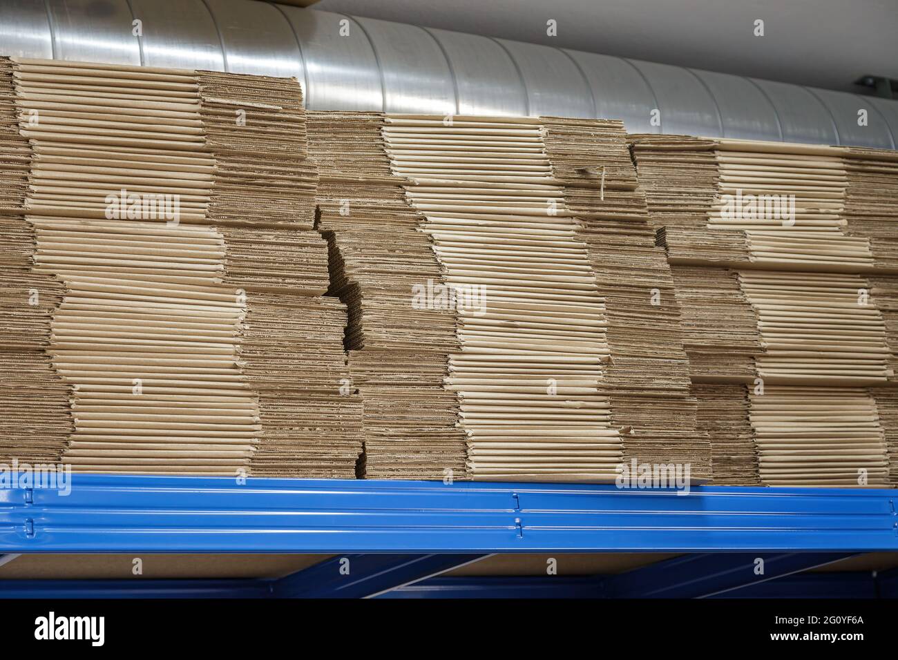 Unused cardboard boxes in a store warehouse Stock Photo Alamy