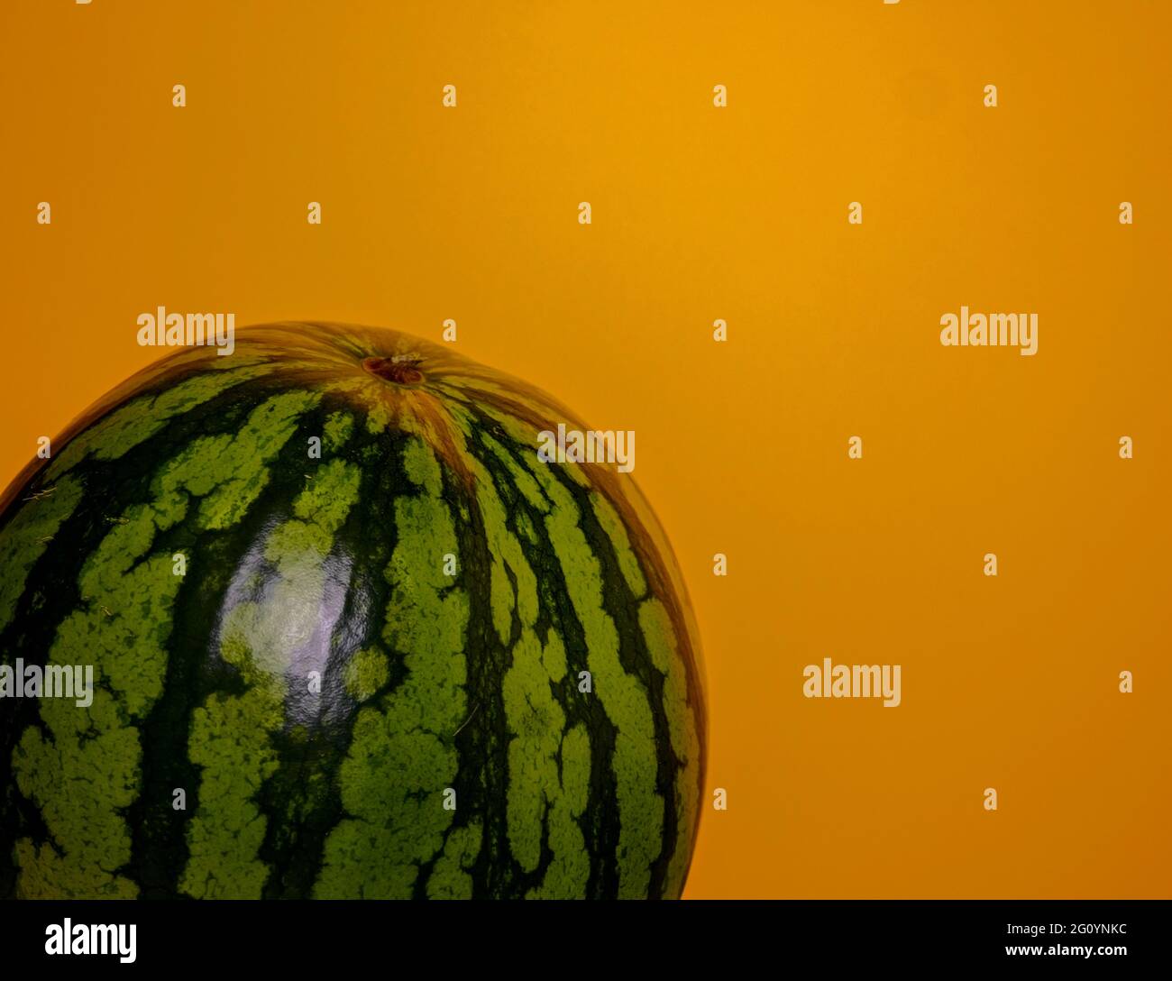 Watermelon isolated on an orange background Stock Photo