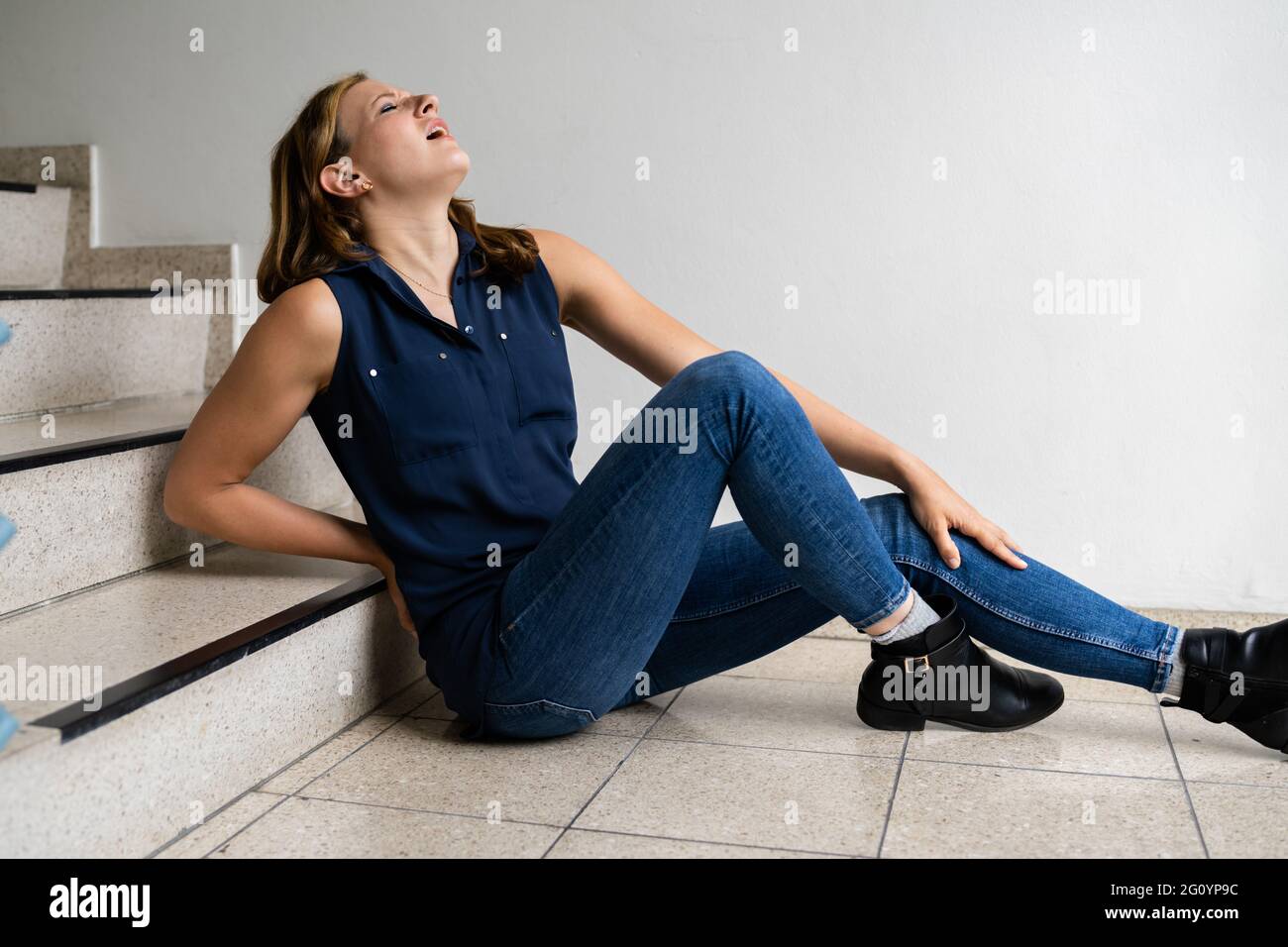 Slip And Fall Down Stairs Injury Accident At Workplace Stock Photo