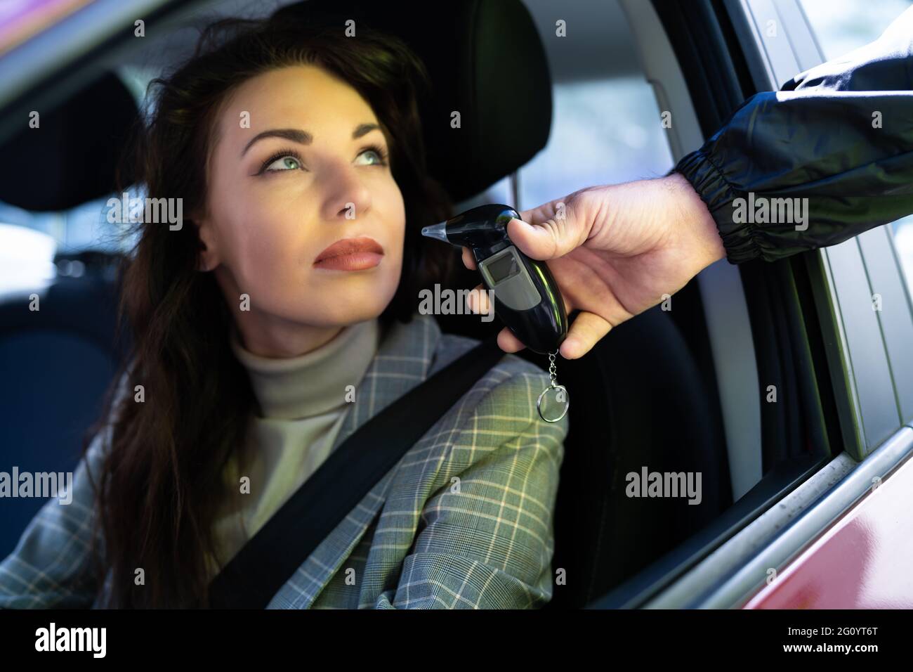 Policeman Doing Driver Alcohol Test Using Breathalyzer Stock Photo Alamy