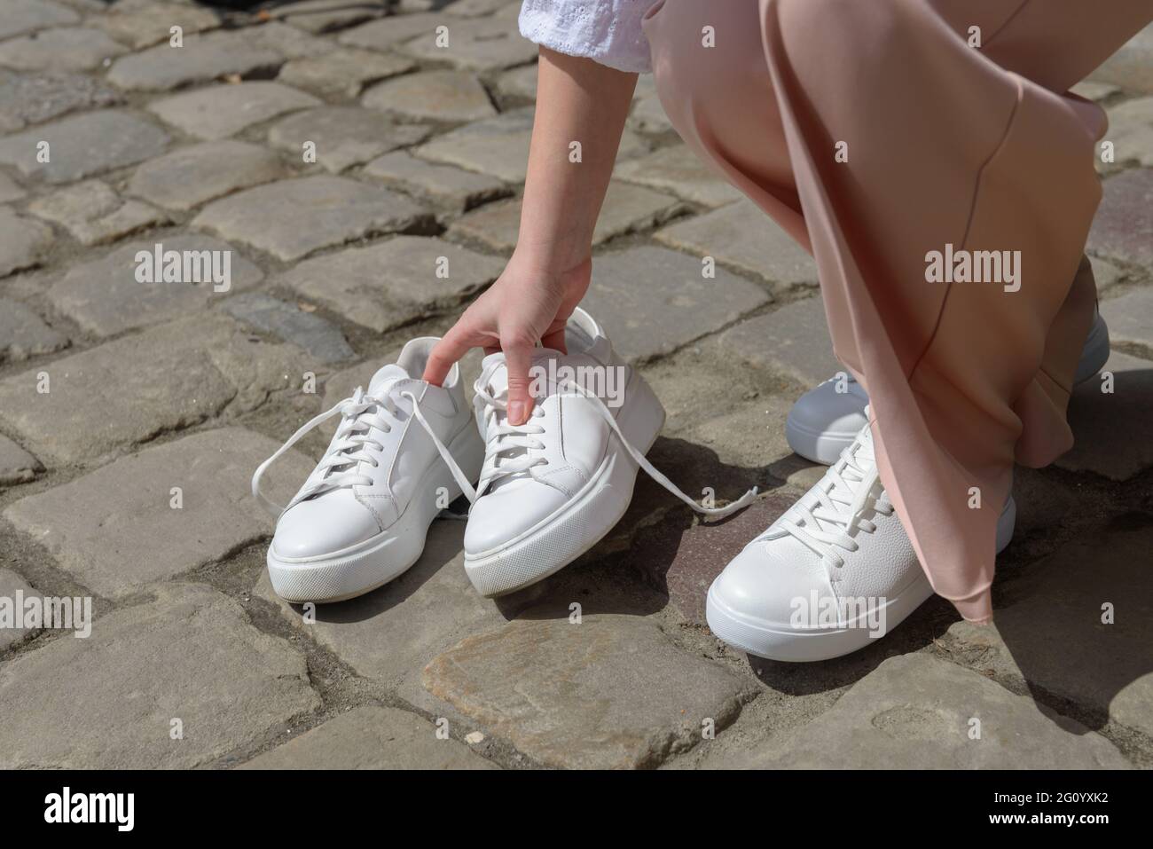 New and old white sneaker shoes . contrast, comparison, different, new and  old, good and bad, clean and dirty concept Stock Photo - Alamy