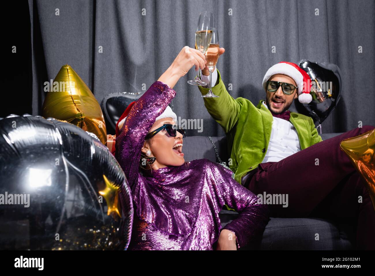 Arab man sitting on couch hi-res stock photography and images - Alamy
