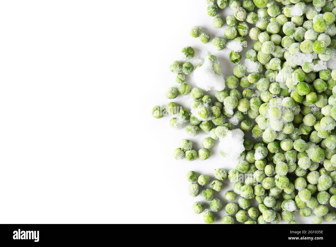 Frozen green peas isolated on white background Stock Photo