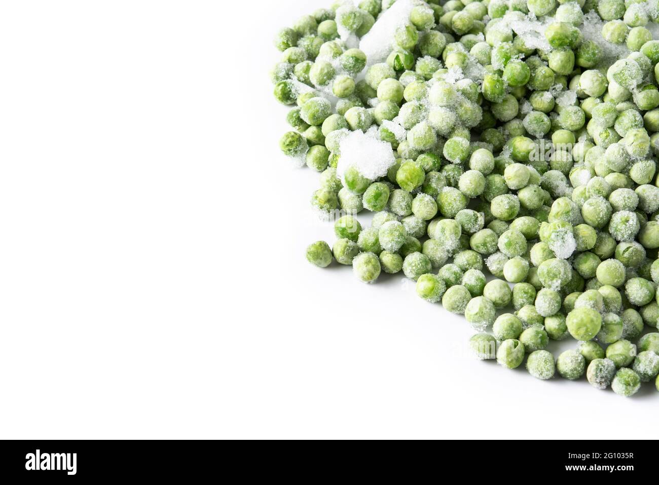 Frozen green peas isolated on white background Stock Photo
