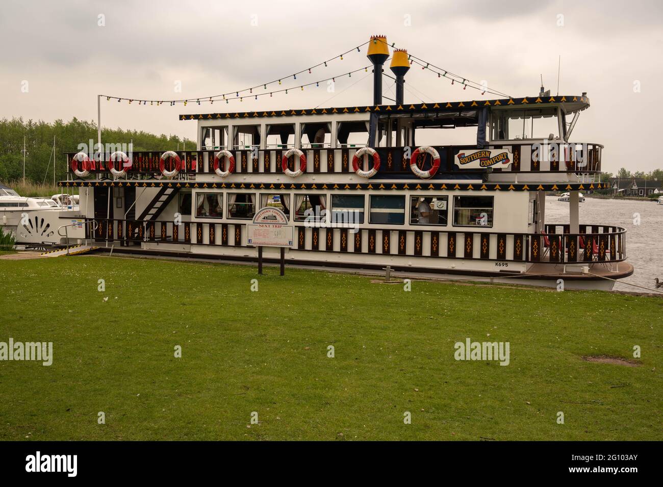 The southern comfort paddle boat tied up at horning river Bure waiting for tourist to go aboard Stock Photo