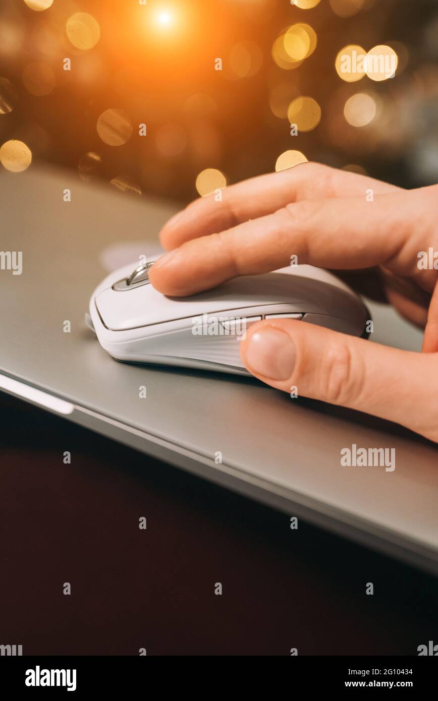 Male hand holding computer mouse Stock Photo - Alamy