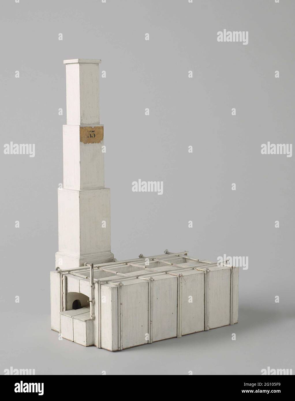 Model of a Heating Furnace. Model of a glow rivet, completely white,  consisting of the oven compartment and the chimney, incomplete. The oven  compartment is provided with trellis on the outside and