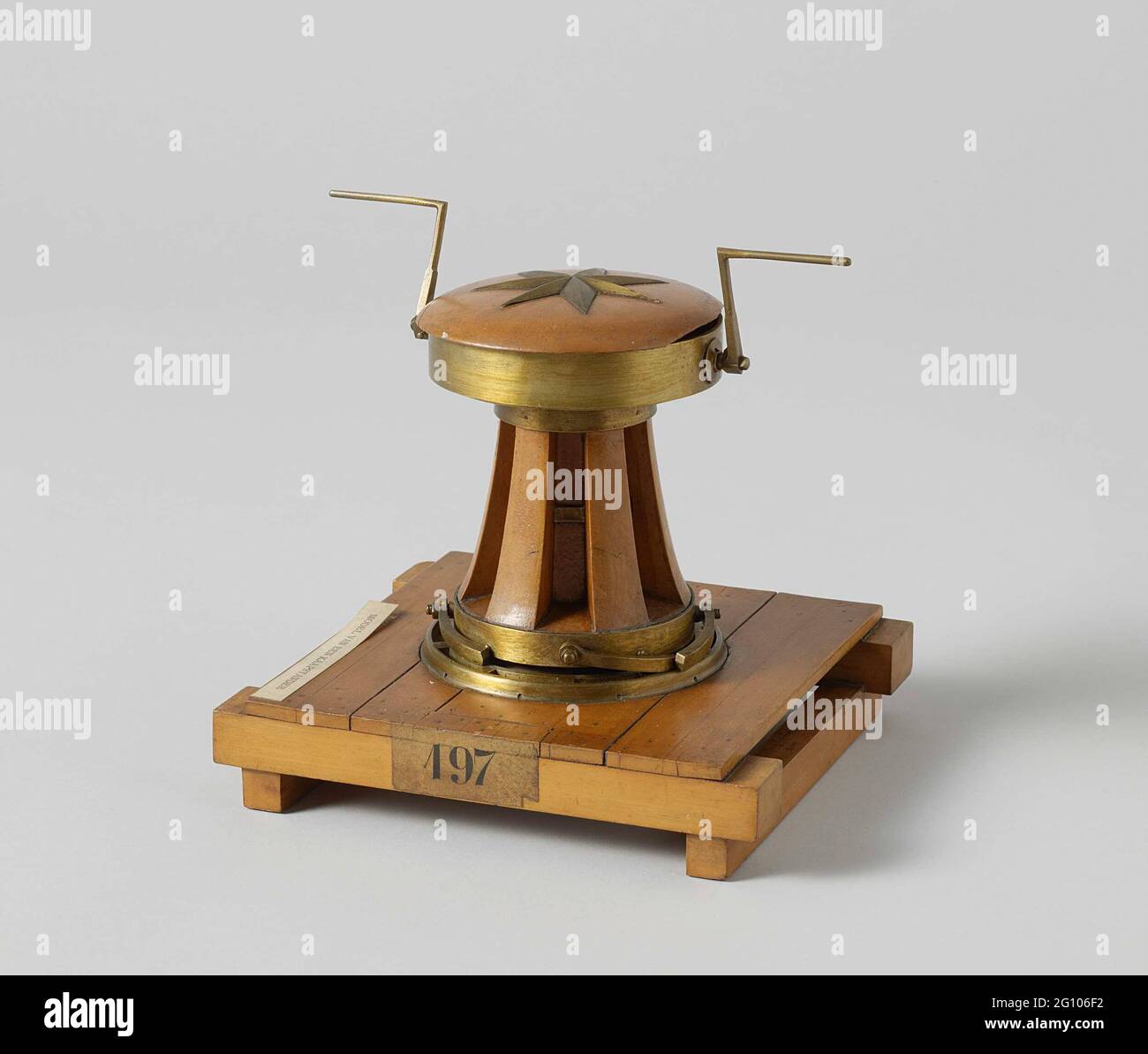 Model of a Capstan with a winch. Model of a capstan on a wooden floor