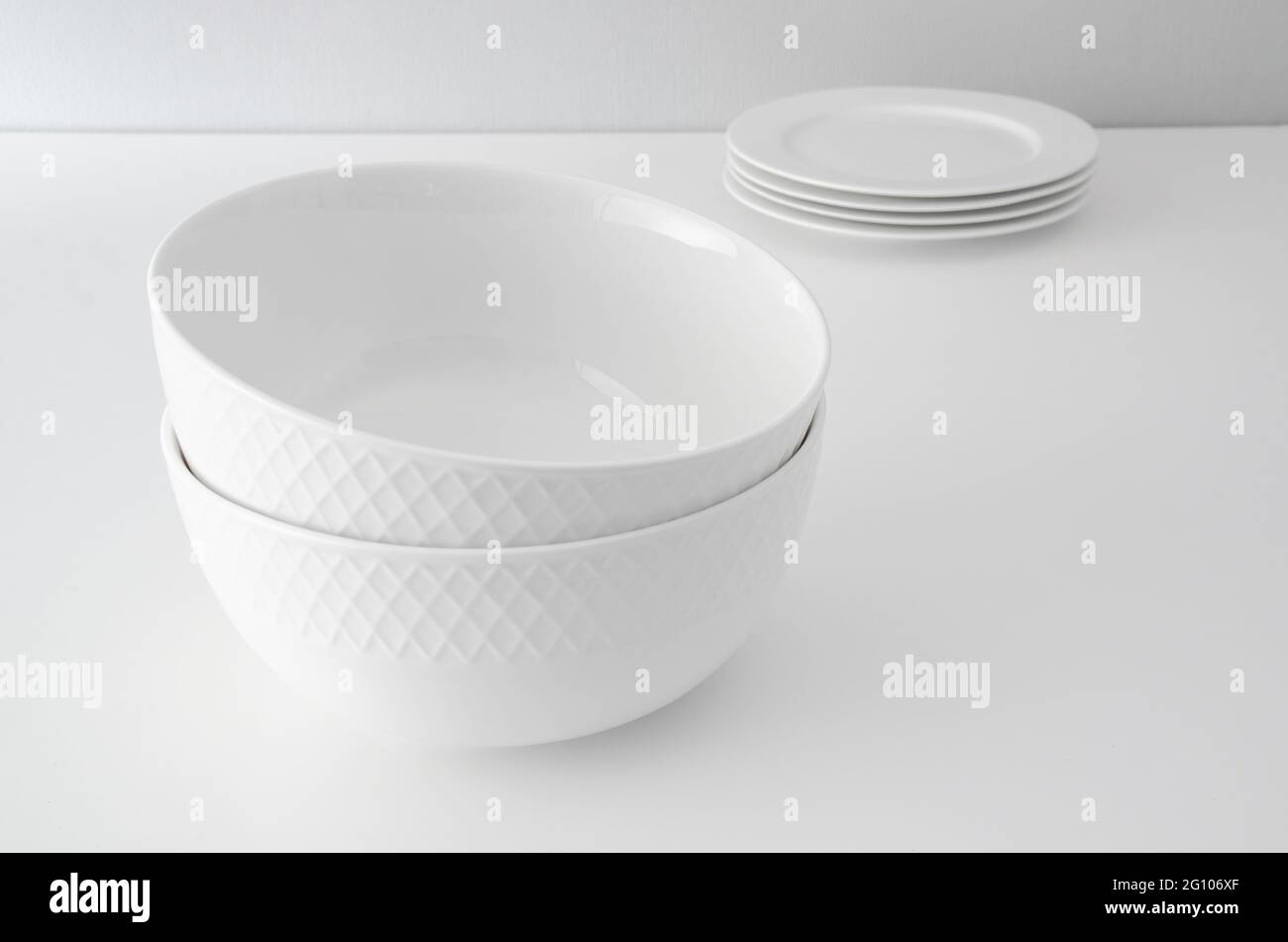 White deep dish on a clean background. Minimalist tableware Stock Photo ...