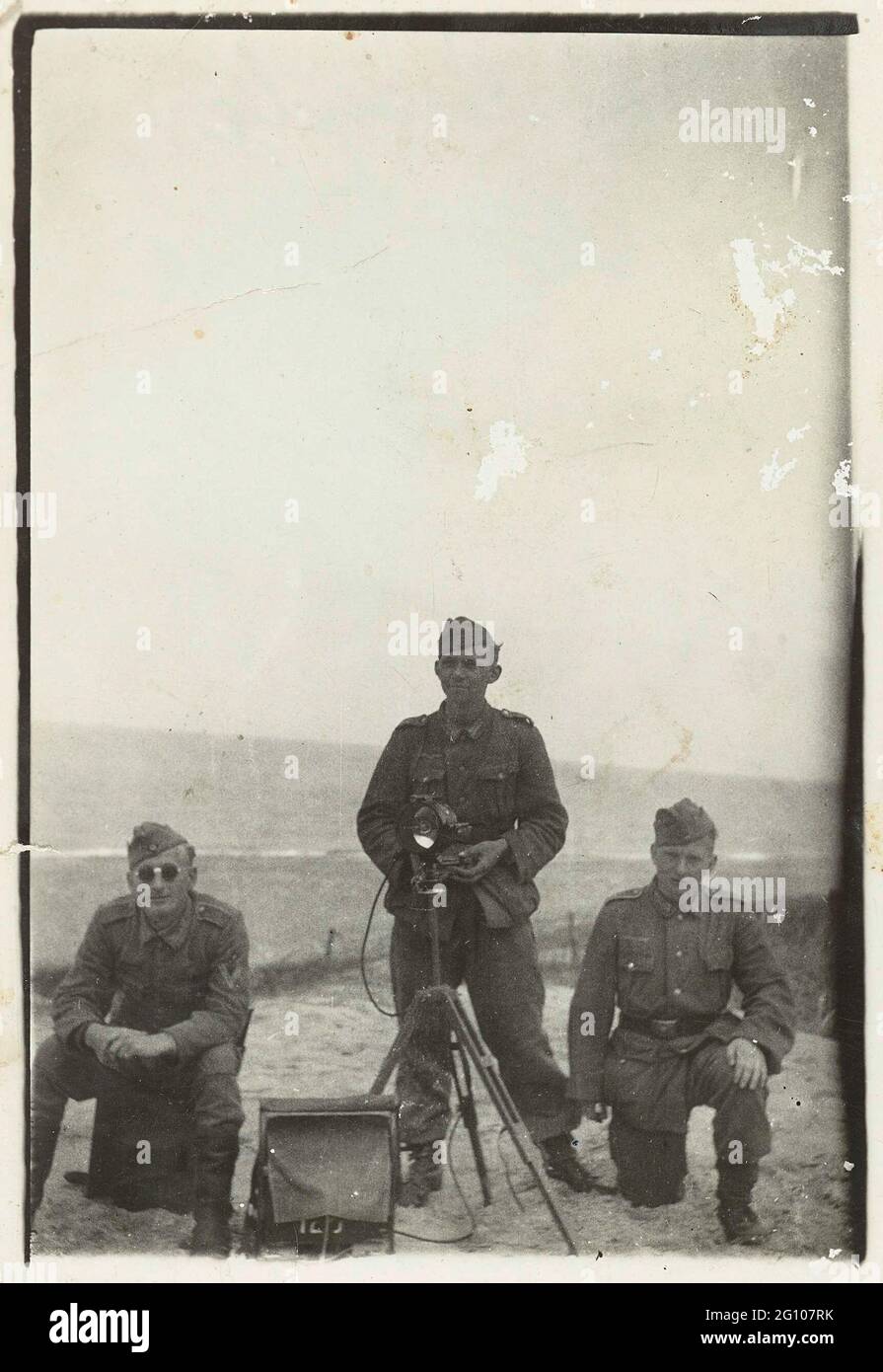Three Wehrmacht soldiers. Three wehrmacht soldiers, one seat, a state