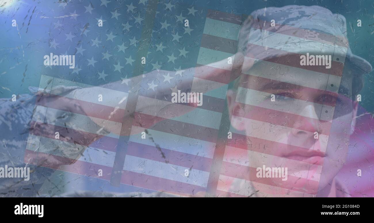 Composition of male soldier saluting over american flag Stock Photo - Alamy
