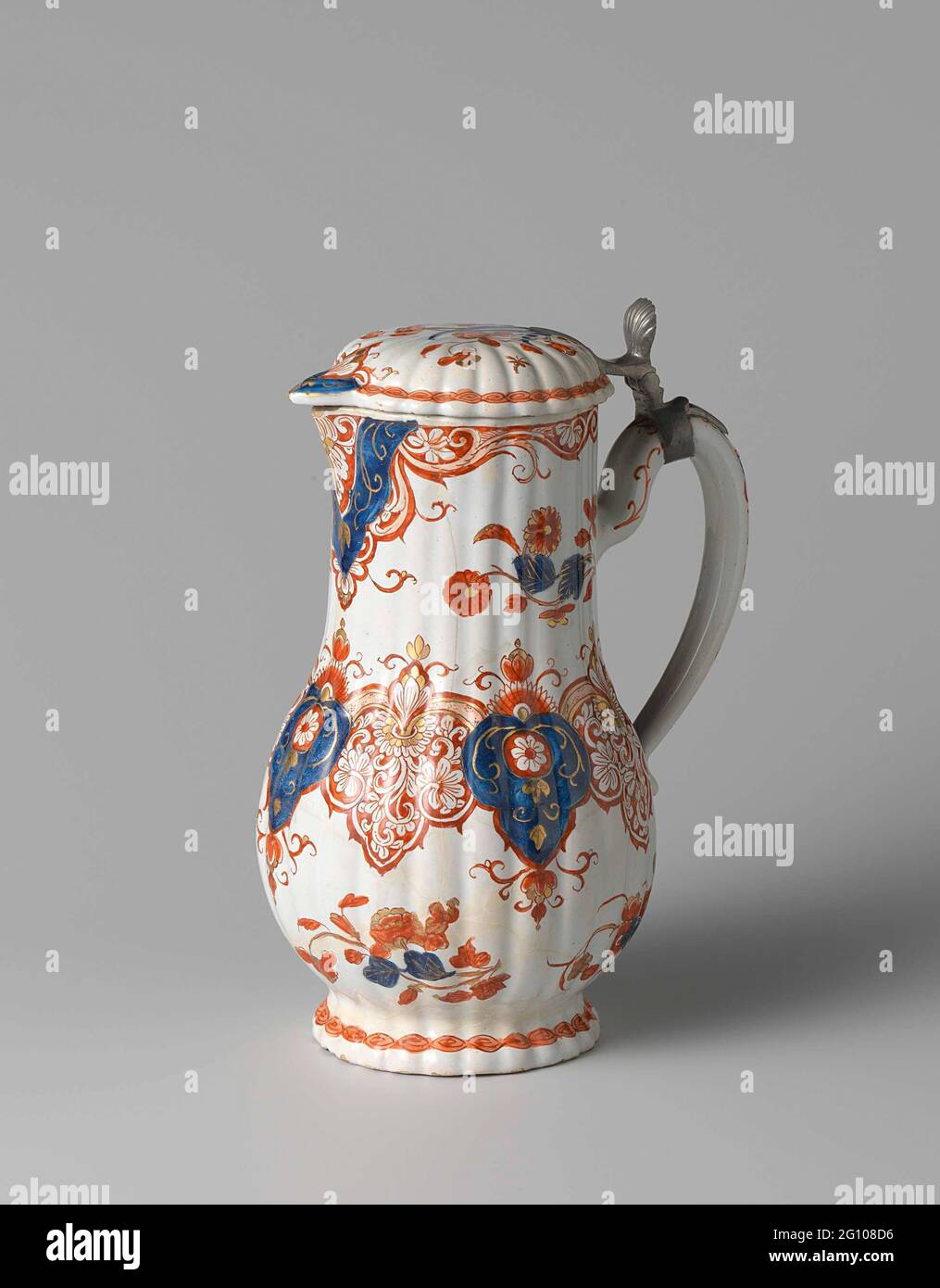Can with lid, Imari-Delft pottery. Can with faience lid. Painted multi-colored. Imii Delft. Marked K No.7. Stock Photo