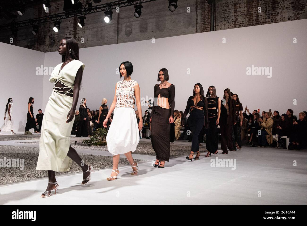 SYDNEY, AUSTRALIA - JUNE 04: Models on the Runway during the Christopher Esber show during Afterpay Australian Fashion Week 2021 Resort '22 Collections at Carriageworks on June 04, 2021 in Sydney, Australia. Stock Photo