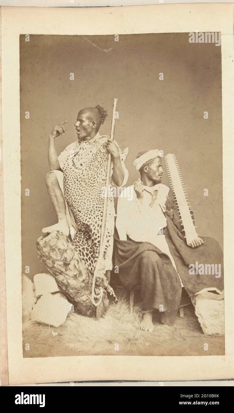 Studio portrait of two men in traditional clothing Stock Photo - Alamy