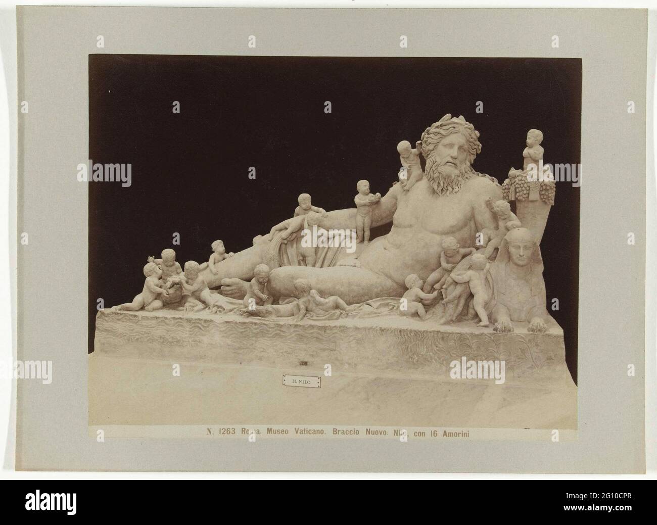 Sculpture of the Nile; N. 1263 Roma. Museo Vaticano. Braccio Nuovo. Nilo, Con 16 Amorini. Nile personification in the form of a horizontal man surrounded by sixteen amorets. Stock Photo