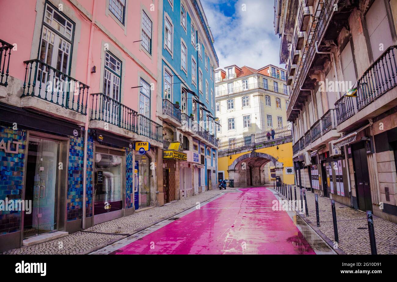 LISBON, PORTUGAL - MARCH 25, 2017: Rua Nova Do Carvalho - Lisbon Pink Street with bars. The Heart Of Lisbon's Night Life in the daytime with no people Stock Photo