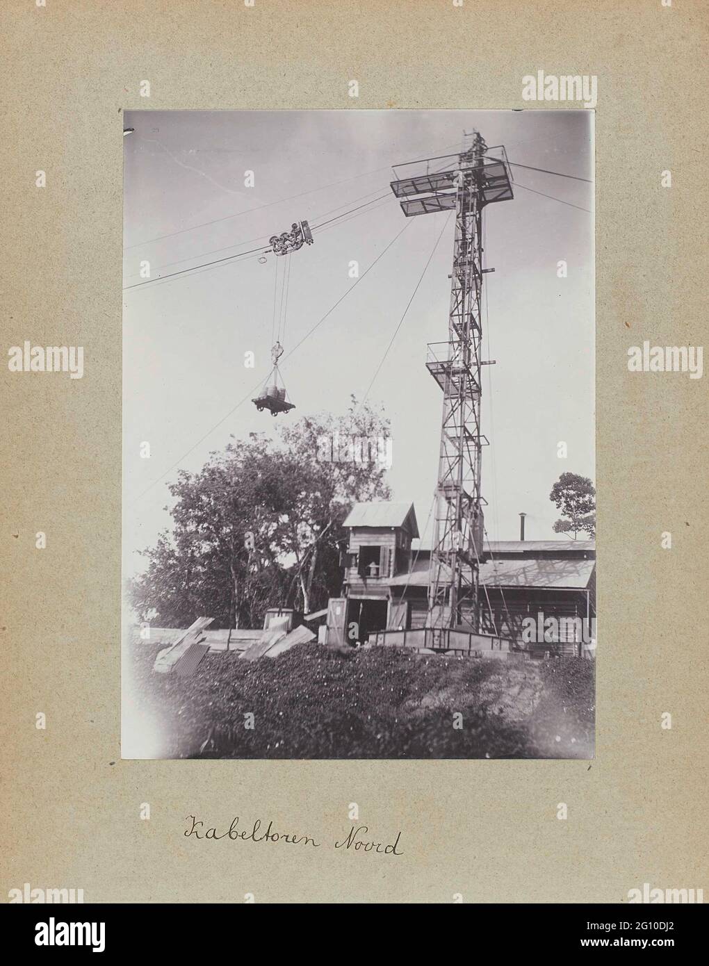 Cable tower Noord. The cable tower on the north side of the surinamer river. Photo in the photo album about the construction of the Lawaspoor road in Suriname in the years 1903-1912. Part of a group of objects from the Wesenhagen family in Suriname. Stock Photo