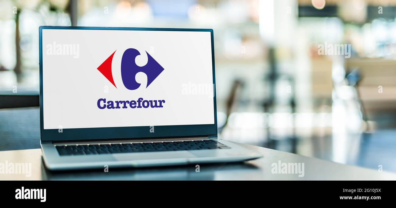 POZNAN, POL - MAY 1, 2021: Laptop computer displaying logo of Carrefour ...