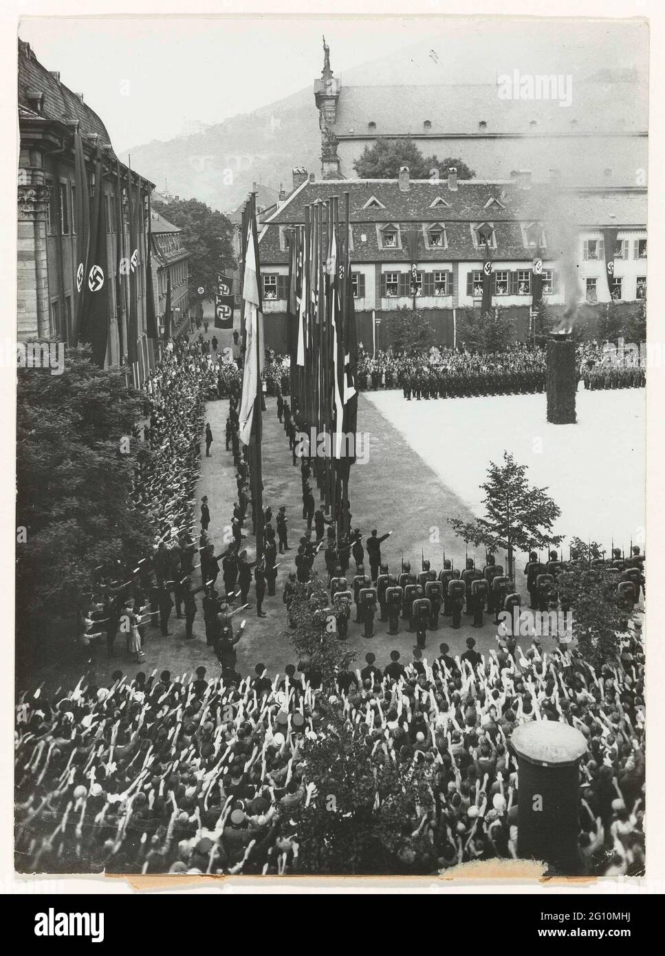 550-year anniversary of Heidelberg. Celebration of the 550th anniversary of the University of Heidelberg. Farly students had come to Heidelberg from 31 countries. They bring the Hitler greeting to the flags from the 31 countries in the courtyard of the university Stock Photo