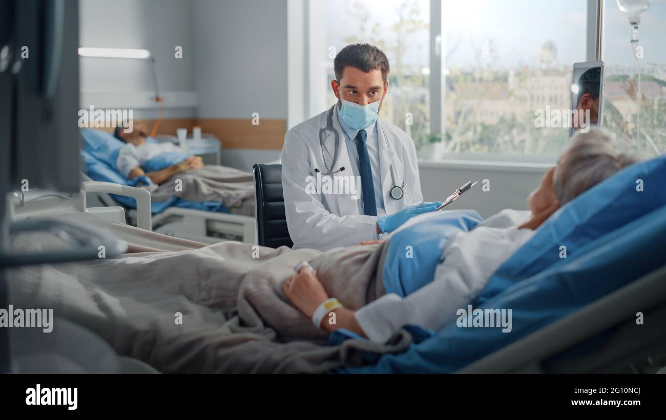 Old man hospital bed doctor hi-res stock photography and images - Alamy