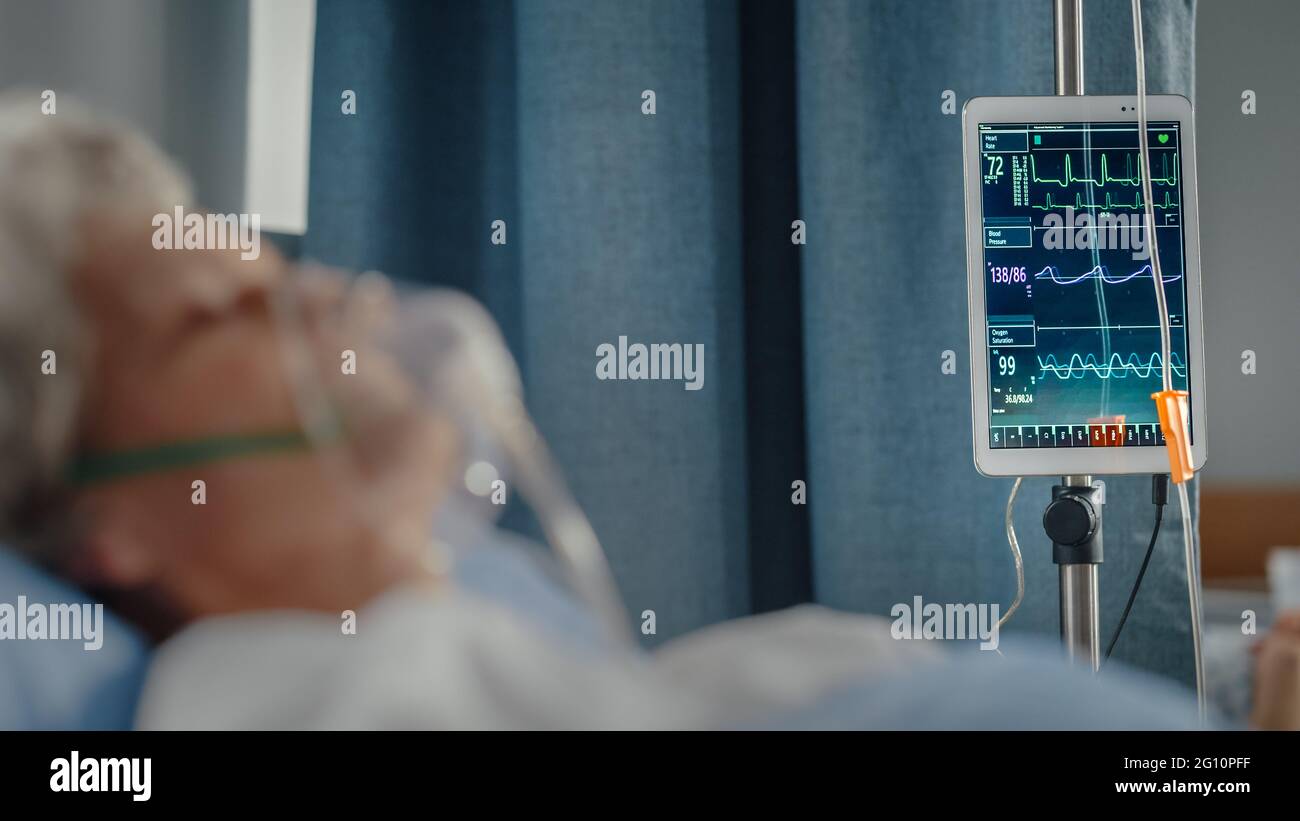 Hospital Ward Portrait of Beautiful Elderly Woman Wearing Oxygen Mask