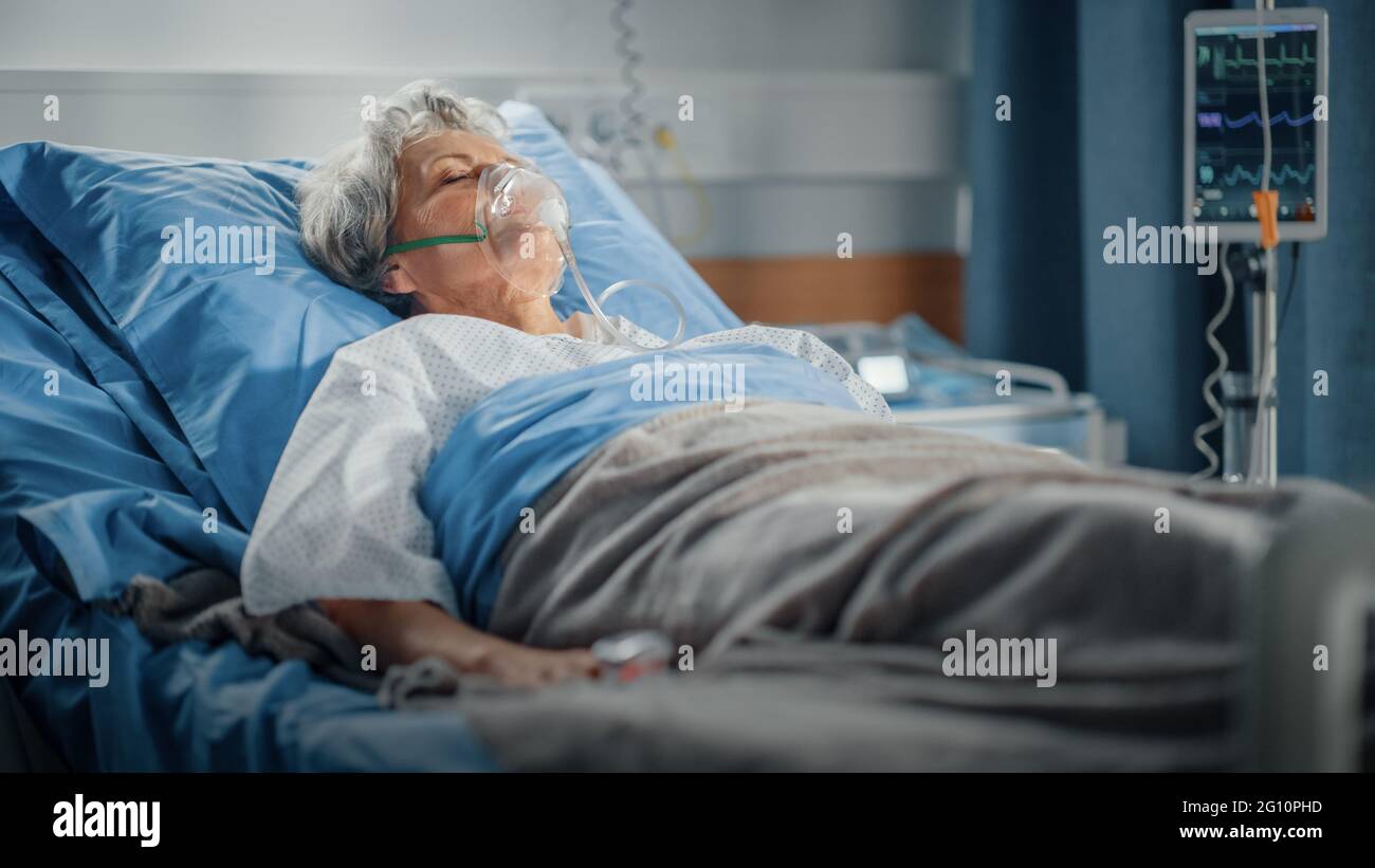 Hospital Ward Portrait of Beautiful Elderly Woman Wearing Oxygen Mask