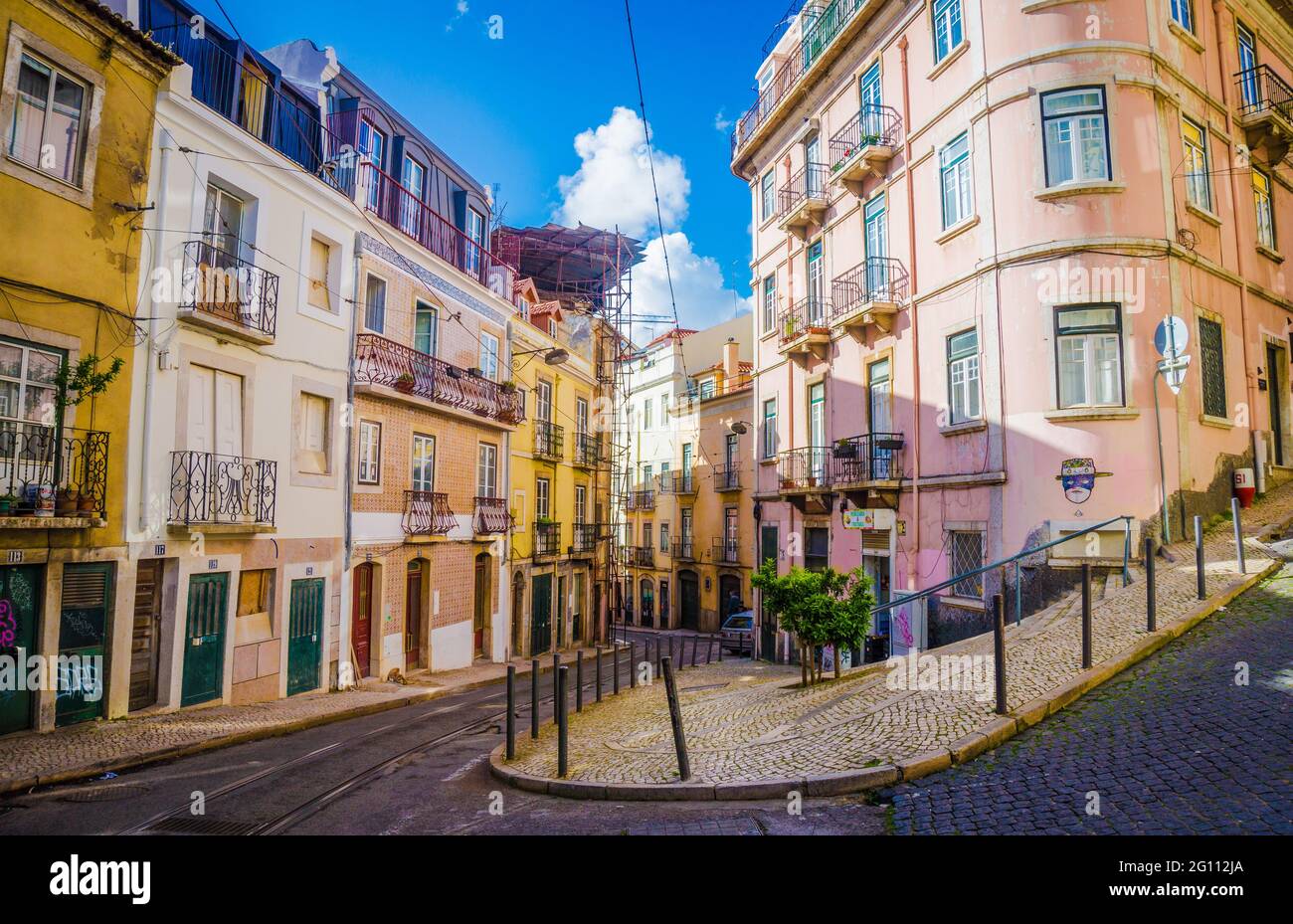 LISBON, PORTUGAL - MARCH 25, 2017: Rua Poiais de Sao Bento street with tram line in Lisbon. Typical streets with colorful buildings with no people, Po Stock Photo