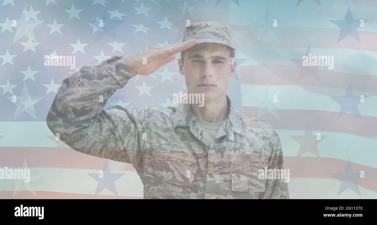 Composition of male soldier saluting over american flag Stock Photo - Alamy