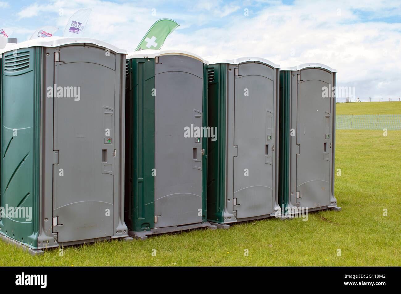 Portable toilets at an outdoor event Stock Photo