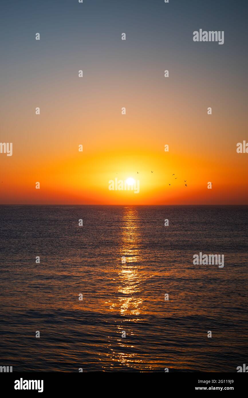 Beautiful sunrise over the sea Stock Photo - Alamy