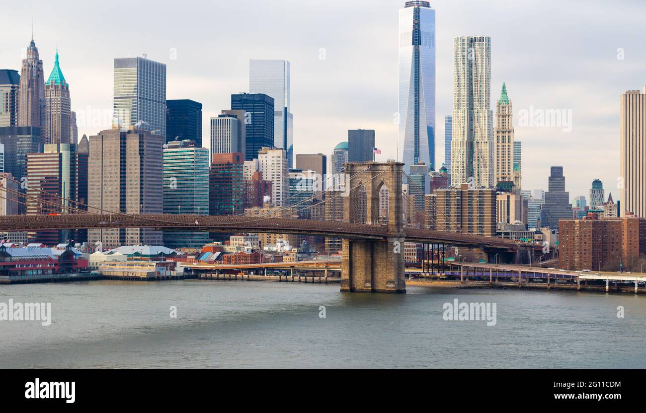 Brooklyn Bridge over East River and Manhattan skyline, New York City. Stock Photo