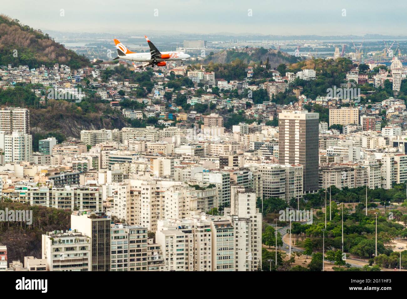 RIO DE JANEIRO, BRAZIL - JANUARY 28, 2015: Airplane of GOL airlines flights over Rio de Janeiro, Brazil Stock Photo