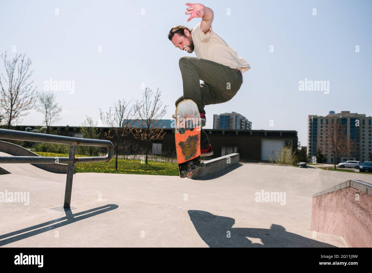 Canada, Ontario, Kingston, Man skateboarding in skate park Stock Photo