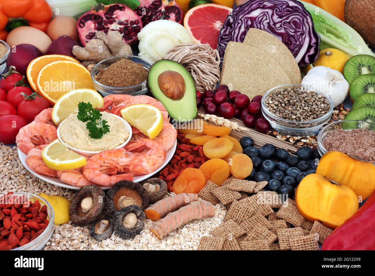 Health food for low cholesterol & low blood pressure diet high in antioxidants, protein, omega 3, vitamins, minerals, anthocyanins & fibre. Healthcare Stock Photo