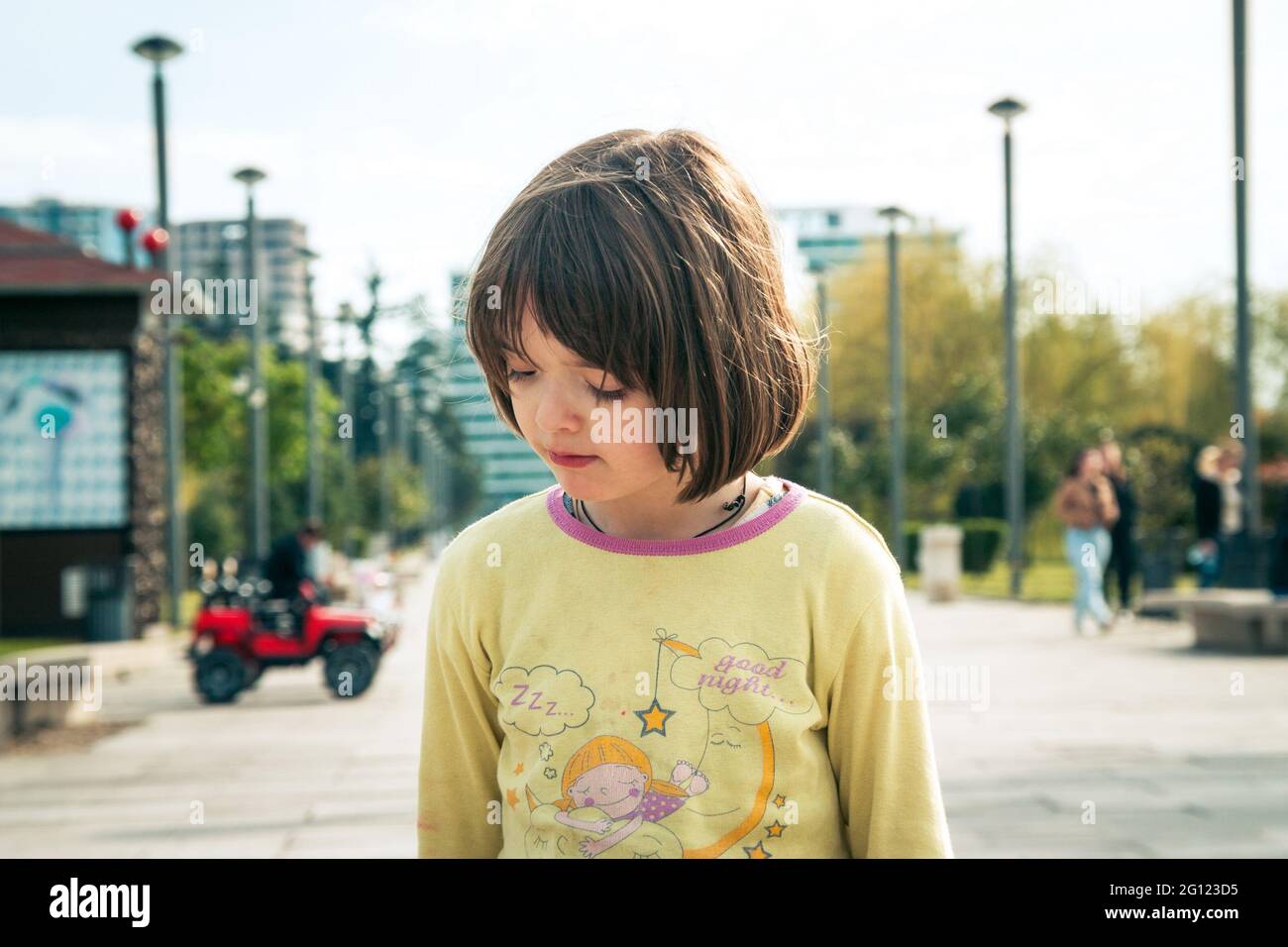 Small girl playing on the playground Stock Photo - Alamy