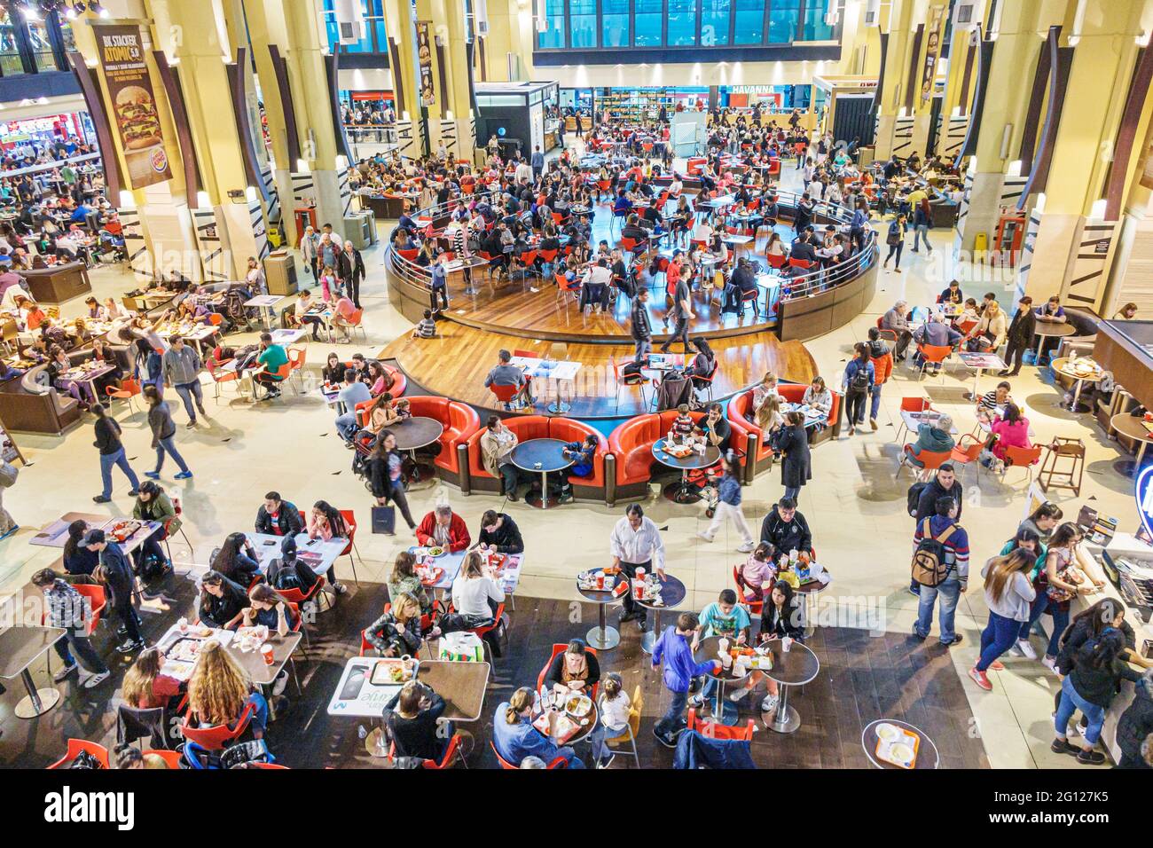 Argentina Buenos Aires Abasto Shopping Mall atrium food court plaza crowded overhead view families restaurant restaurants dining Stock Photo