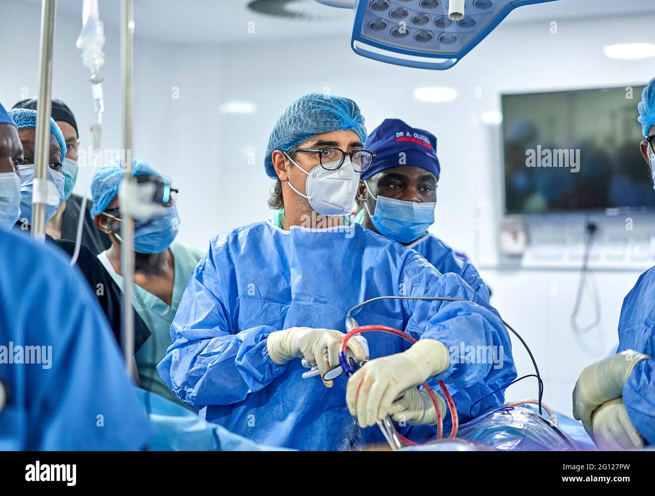 doctor and assistance Medical team performing surgery on a patient with