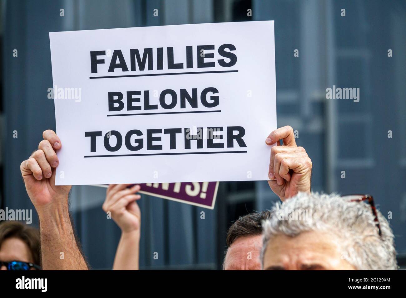 Florida Miami downtown Keep Families Together Protest anti-Trump immigration family child separation policy activist protester sign Stock Photo