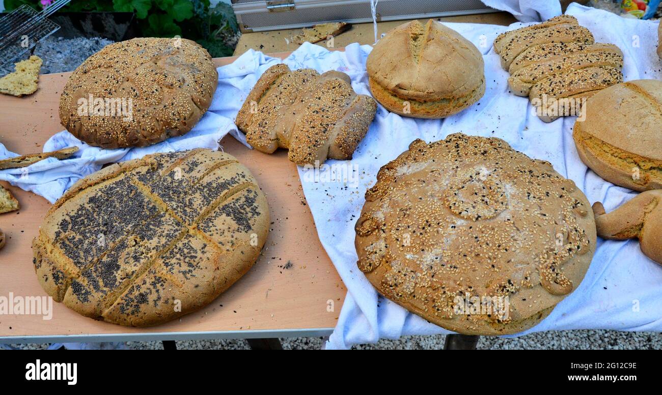 A selection of traditional handmade Cypriot breads from the stone oven Stock Photo