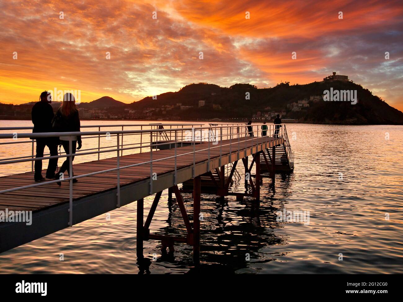 Sunset, Nautical Club Pier, La Concha Bay, Donostia, San Sebastian, Basque Country, Spain Stock Photo