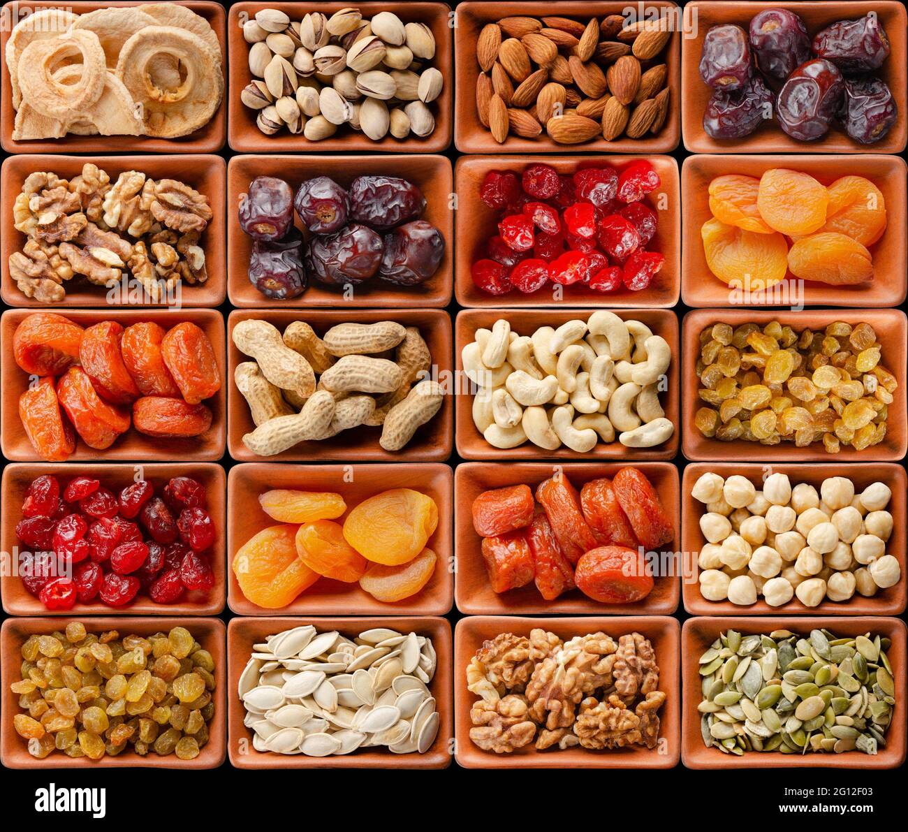 Seamless flat lay food background of dehydrated fruits, seeds and nuts ...