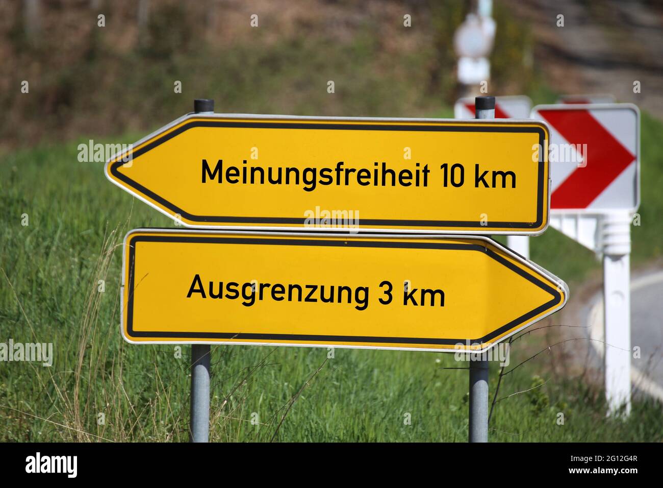 Symbol image on the topic of freedom of expression, Germany. Signposts show the options freedom of expression and exclusion. Stock Photo