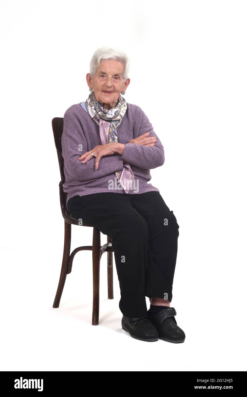 Old woman sitting side view chair Cut Out Stock Images & Pictures - Alamy