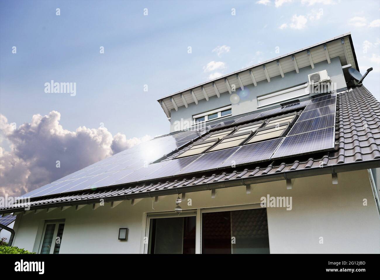 Single family house with solar system or photovoltaic system. Stock Photo