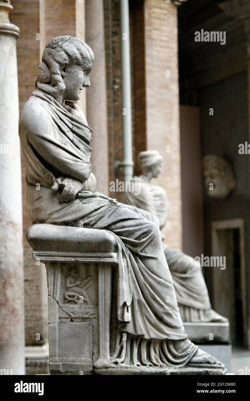 View of a sitting ancient roman statue in the Vatican city Stock Photo